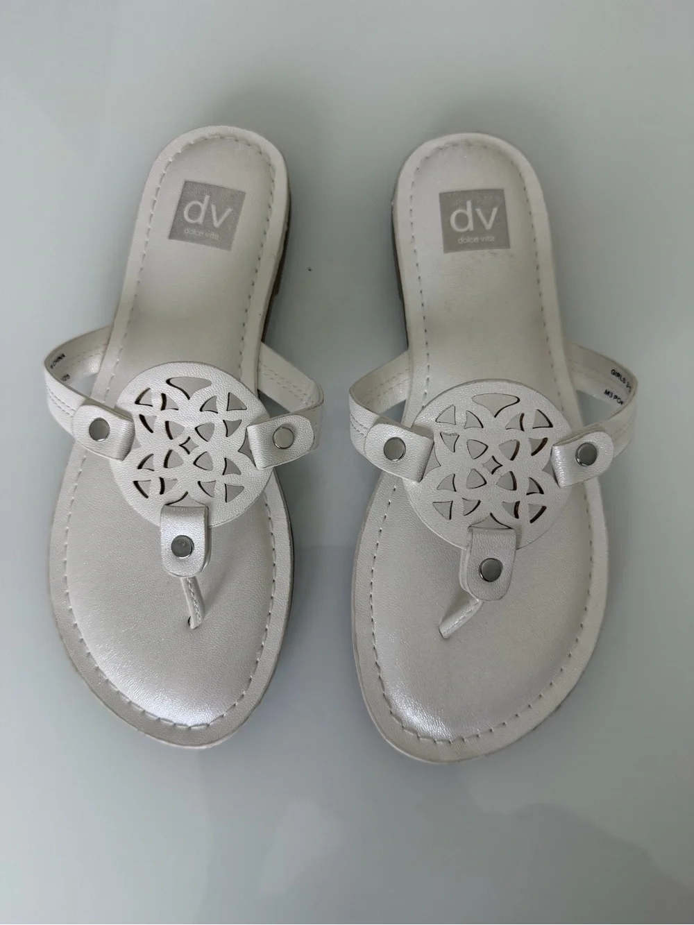 DV by Dolce Vita White Metallic Cutout Medallion Thong Sandals